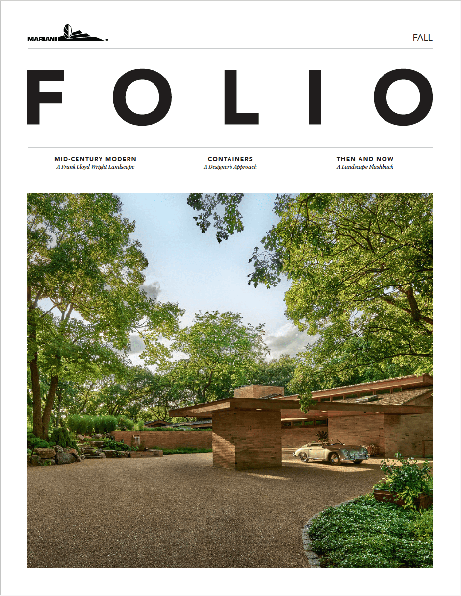 Driveway view of a mid-century modern house surrounded by trees, with a vintage car parked in front, featured on the cover of a magazine titled "Folio.