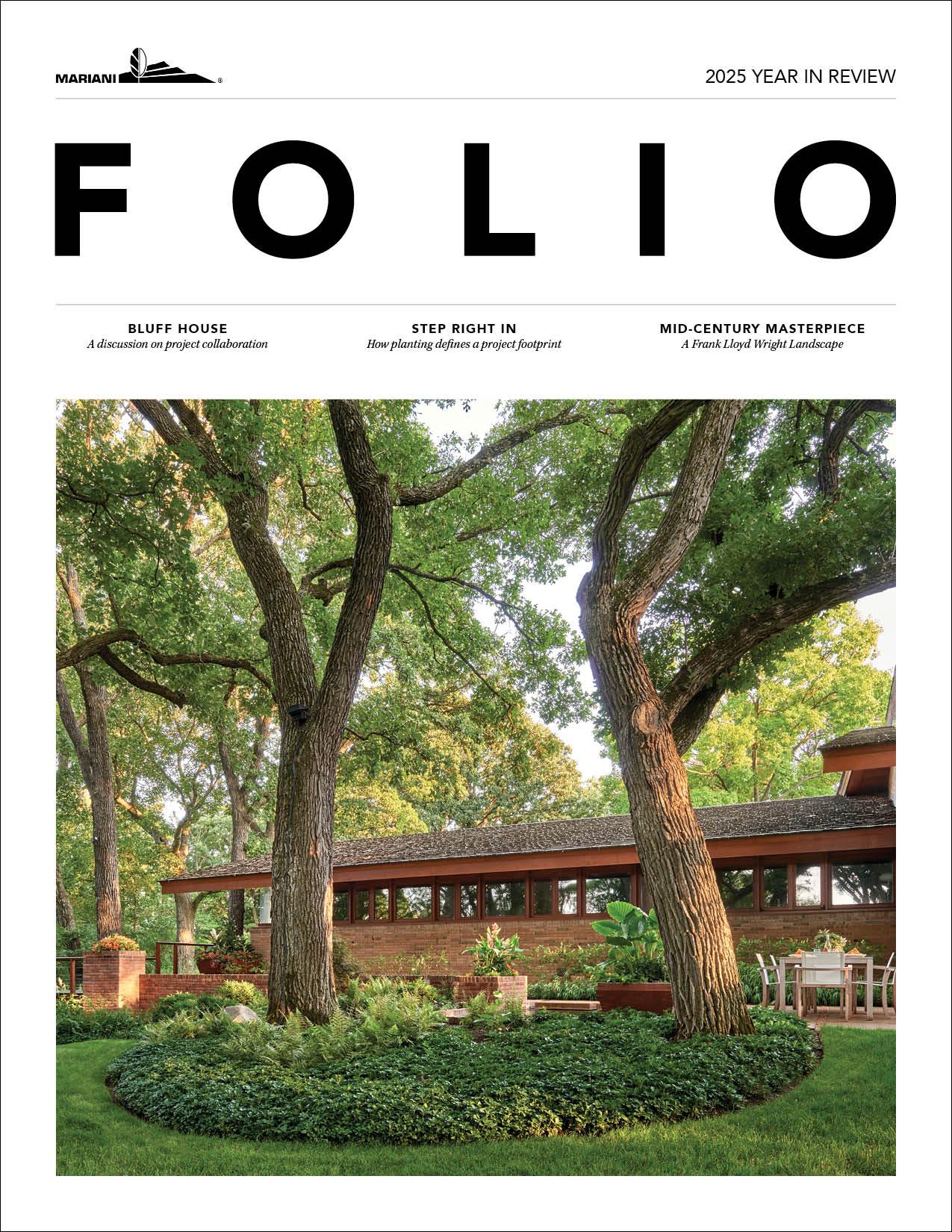 A mid-century modern house with large windows sits among tall trees and landscaped gardens under a clear sky, featured on the cover of Folio magazine.