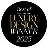 A black circular badge reads "Best of Modern Luxury Luxury Design Winner 2025" in white and gold text.