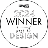 Black and white award seal for "2024 winner best of design" by modern luxury interiors chicago.